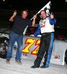 The second twin-50 that night in September 2009 was won by Wayne Anderson - here with car owner Tom Sytsma (Buddy Bryan Photo)