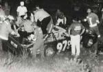 Richard Brinson is cut from his car after sliding in oil and hitting the dirt bank - was badly hurt but recovered...