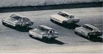 Lee Roy Yarbrough #12 and Richard Petty #43 lead eventual winner Sam McQuagg #98 and Curtis Turner #13 - '66 Firecracker 400...